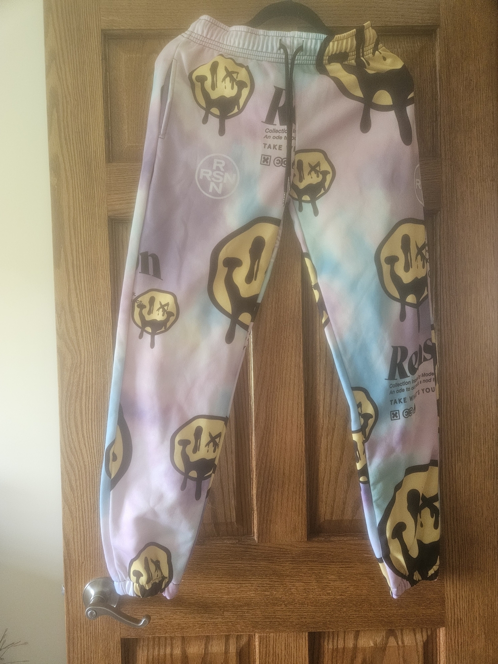 Reason Pastel Tie-Dye Joggers with Yellow Smiley Accent